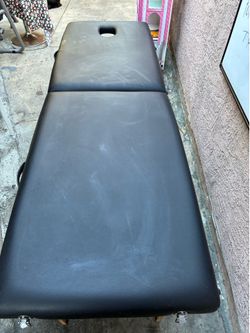 Massage table