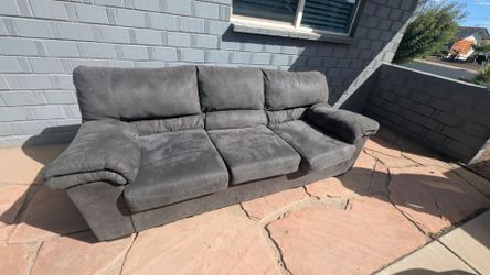 Free dark grey sofa. In old town Scottsdale area
