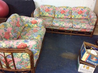 Ratan sofa and matching love seat in good condition