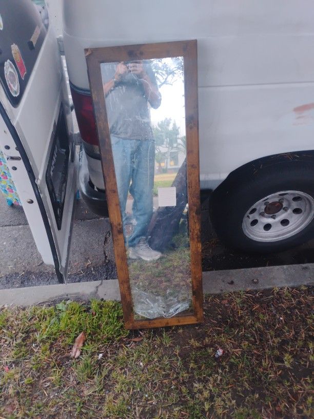 Mirror With A Hidden Cabinet Inside