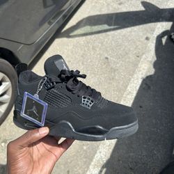 Jordan 4 “Black Cat”