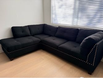 Modern L-shaped sectional sofa with ottoman