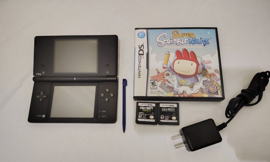 Black Nintendo DSI With Games And Accessories
