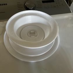 white plastic rotating cake turntable or decorating stand.