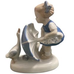 Carl Schneider: vintage porcelain figurin "Girl fighting off goose with umbrella ". 1950s.