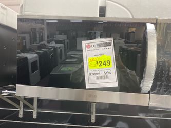 Samsung 2.1 cu. ft 1000 W Fingerprint Resistant steel Over the Range  Microwave-1  year warranty
