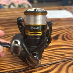 Spinning Reel Shimano Sahara 2500 With Braided Line 