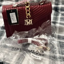 Brand new Badgley Mischka red quilted crossbody bag with tags