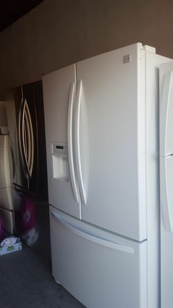 Kenmore brand refrigerator measures 36 wide and 70 high 2 months warranty delivery and installation