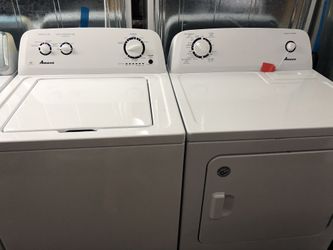Used Amana High Efficiency washer and dryer set. 1 year warranty