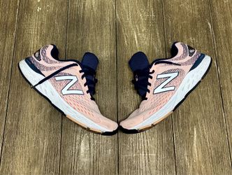 New Balance 680 running shoes pink navy