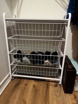 white metal organizer h