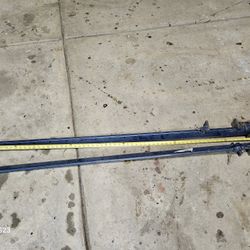 Metal Clamps. Approximately 66 Inches Long