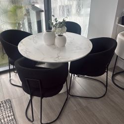 Either Round Table With 4 Upholstered Chairs