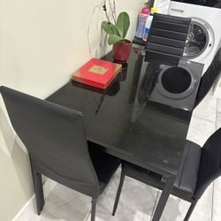 Small glass dining table