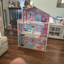 Doll House very good condition about 5 Ft high.