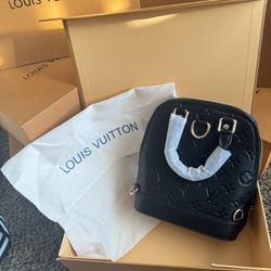 Black Louis Vuitton Backpack/ Handbag