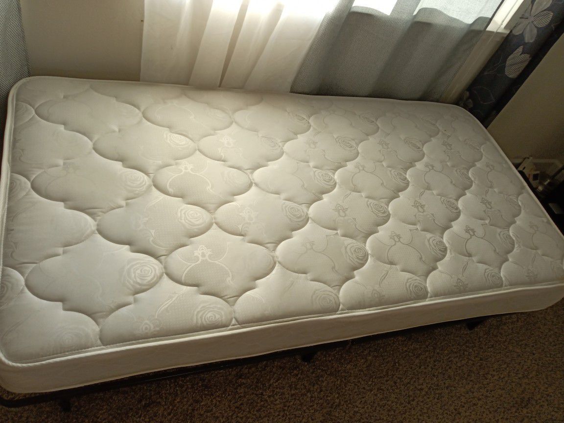 Twin folding bed frame and mattress