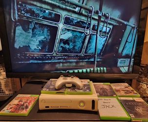 Xbox 360 with 7 games, controller and Sony Bravia 46” TV