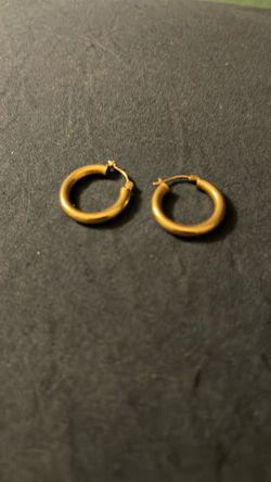Gold women’s earrings