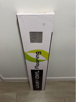 SPC (Stone Plastic Composite) luxury vinyl flooring.