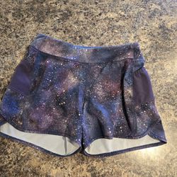 Athleta multicoloured galaxy print running shorts Size XL Size Girls 14