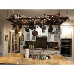 Old Baby Crib Springs As A Kitchen Pot Rack 