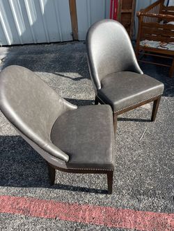 Game chairs leather  $100.00 ea