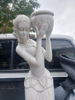 4' stone woman sculpture