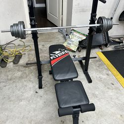 Rack stack and bench, bar , 80Lb weights