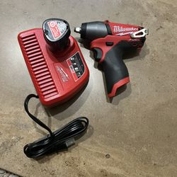 Milwaukee 3/8 Impact Wrench 12v  Battery and Charger Brand New 