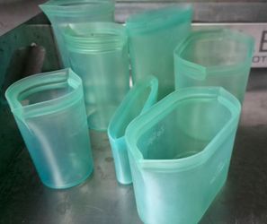 Zip Top 100% Platinum Silicone, which is BPA-free, lead-free, and phthalate-free - 
7 Bag set - Like New