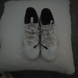 Puma Future 7 Play soccer cleats in white and black. 