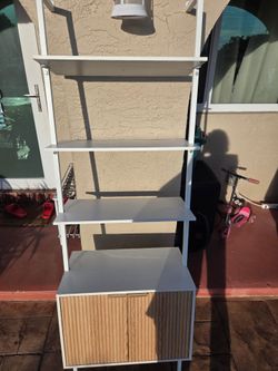 House shelving unit with cabinet