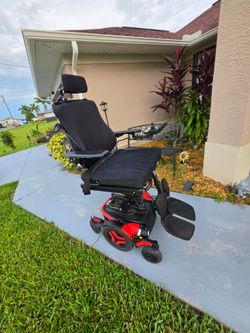 Power Wheelchair with Tilt and Recline with 4 brand new batteries and boho cushion in outstanding condition