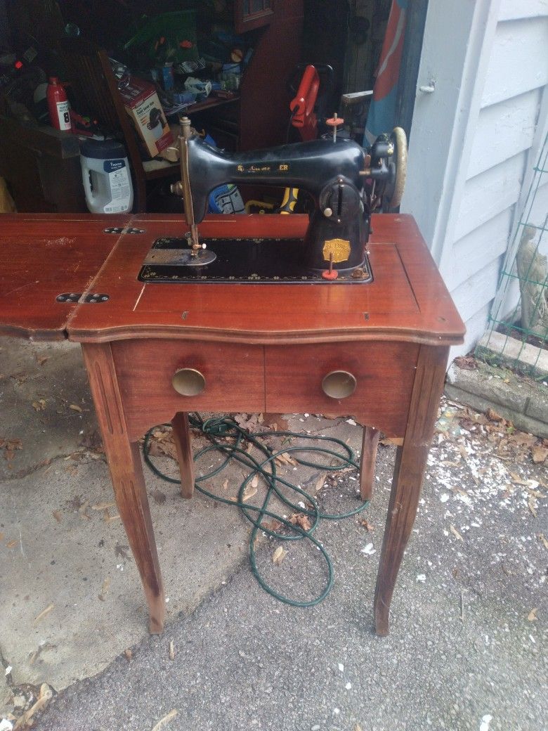 Vintage Sewing Machine And Cabinet