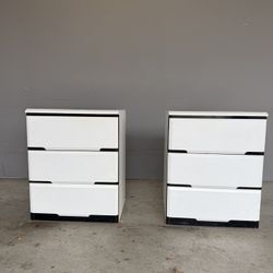 White bedside tables. White Chest of drawers