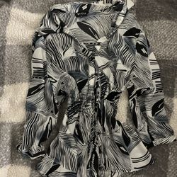 Black, light blue and white abstract print long-sleeve blouse with a drawstring waist