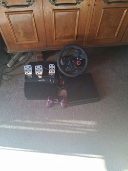 Playstation 4 bundle with logitech race wheel and peddles