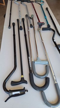 13 Used Extendable Walking Canes