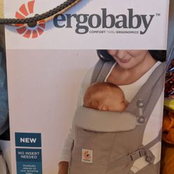 Ergobaby. Guaranteed New!! Every Mama Need This!