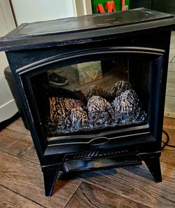 Freestanding electric fireplace
