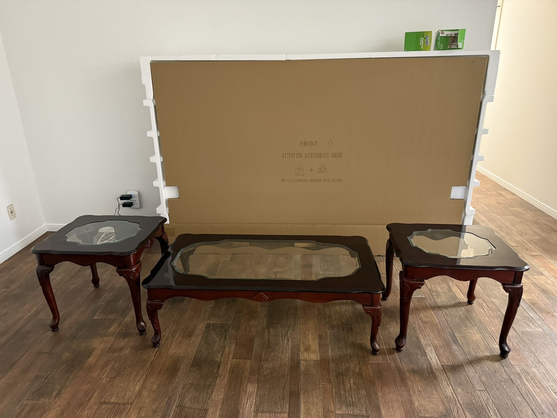 Antique coffee table and a patching pair of smaller tables