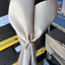 140-150 champagne color cloth napkins. 