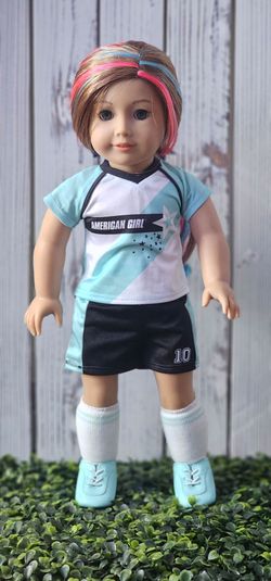 American girl truly me doll wearing soccer outfit