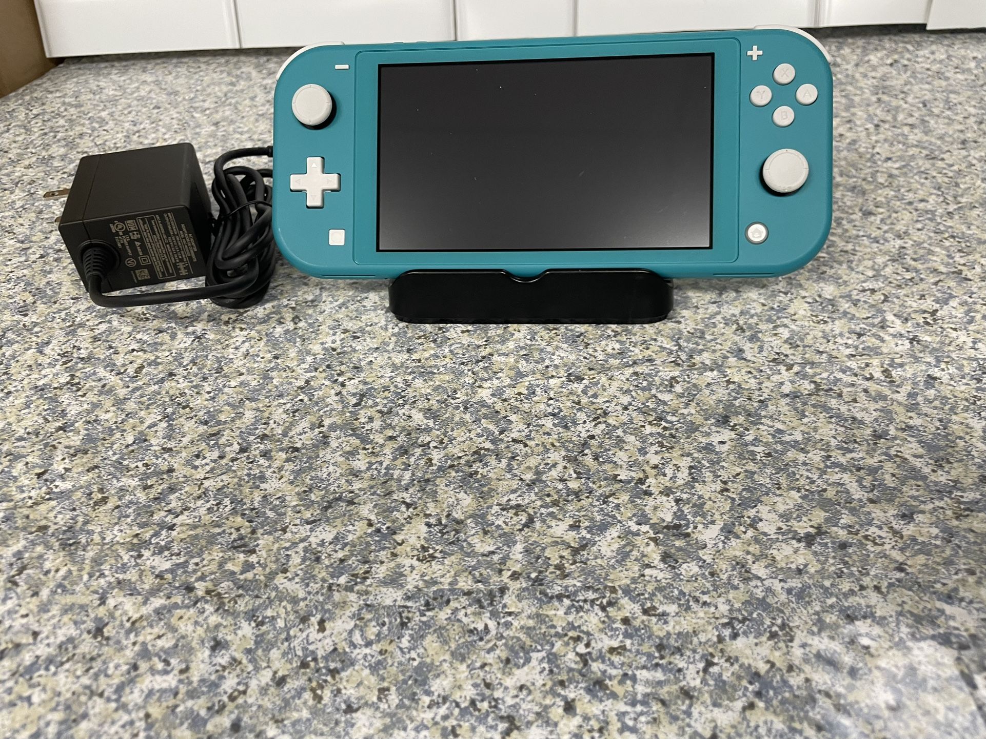 Nintendo Switch Lite 32 gb no offers or trades please!!