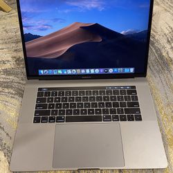 MacBook Pro  15” inch i7 intel Core  16 GB Ram 256 Flash Drive 