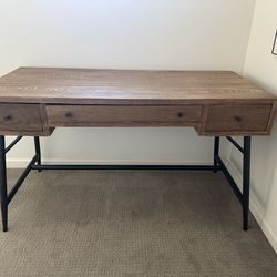 Modern wood desk with black legs