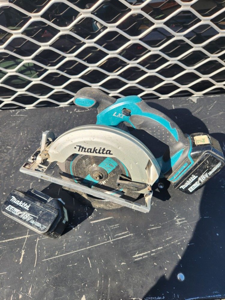 6.5 Makita Saw. 2 18v Batteries.
