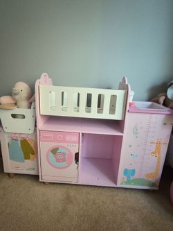 Toy kitchen and baby doll crib and highchair